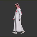 Man In White Thobe And Pink Ghutra Standing With Glasses On Gray Background