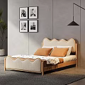 Double Bed With Scalloped Beige Headboard Wooden Frame Orange Pillows And Black White Wall Art Green Plant Bright Light