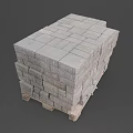 Gray Stone Blocks Neatly Stacked on Sturdy Wooden Pallets in Orderly Arrangement