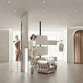 Modern Clothing Store Interior With Mannequins Wearing Dresses And Hanging Clothes Racks