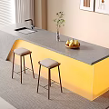 Modern Bar Counter with Gray Countertop Yellow Lighting Upholstered Stools Vase Plant and Fruit Bowl