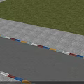 Road Infrastructure With Colorful Stripes Paved Along Roadside Near Green Grass