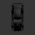 Gray Sports Car With Rear Spoiler And Sleek Design