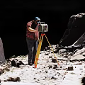 Industrial Equipment For Rock Mining At Quarry Worksite With Large Rocks And Operator