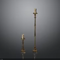 Elegant Golden Candle Holders With Tall And Short Designs On Black Background