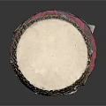 Traditional Decorative Drum with White Drumhead Golden Edges Intricate Patterns on Red Cushioned Base
