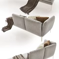 Modern Gray Three Seater Sofa With Decorative Pillows Cozy Blanket And Metal Legs