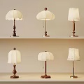 Various Designed Table Lamps Featuring White Shades And Wooden Metal Bases On Shelves