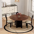 Round Wooden Table And Two Black Chairs with White Cushions and Flower Vase by Window