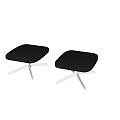 Modern Black Stools With Silver Metal Legs Against Light Wall On Marble Floor