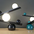 Modern Balanced Table Lamp With Illuminated Spheres And Black Teal Marble Bases