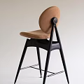 Minimalist Bar Stool With High Back Leather Seat And Sleek Black Metal Frame
