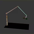 Modern Desk Lamp With White Long Arm Black Base Red Accents And Black Clamp