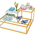 Modern Multilayer Display Shelf With Orange Frame Bottles Teddy Bear And Flowers