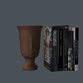 Swing Door in Room with Brown Vase and Stack of Books
