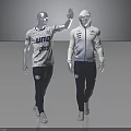 Two Mannequins Displaying Athletic Sportswear With White Tops Dark Pants And Brand Logos