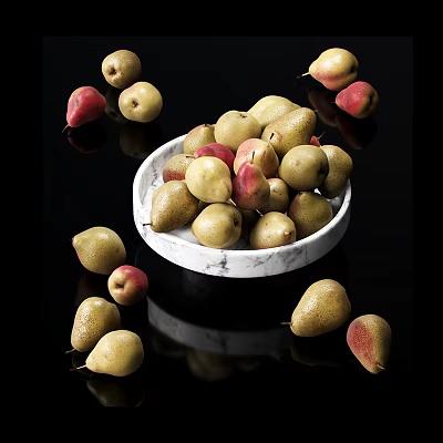 Fresh Yellow And Red Pears In White Marble Bowl Scattered Around Black Surface 3d model