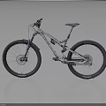 Silver White Mountain Bike With Black Off Road Tires And Suspension System