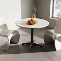 Modern White Leisure Chairs With Round Table Fruit Plate And Green Plant By Window