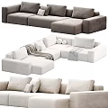 Modern Sectional Sofa Design With Soft Cushions Throw Blankets And Neutral Beige Gray Tones