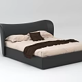 Double Bed with Black Curved Headboard Light Colored Mattress White Pillows Brown Cushion and Blanket