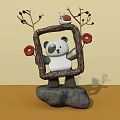 Interactive Area With Panda Holding Frame Decorated By Branches And Flowers On Stone Base