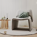 Gray Leisure Chair With Green Cushion On Round Rug By Side Table And Floor Lamp