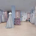 Bridal Shop Interior With Various Wedding Dresses On Display And Floral Decor