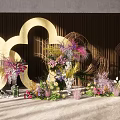 Decorative Scene With Gold Cloud Shaped Decor Colorful Flowers Woven Decorations And Dark Wooden Wall