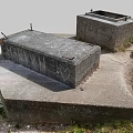 Weathered Concrete Structures With Square Openings Rusty Metal And Grassy Mossy Surroundings