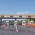 Roadway Toll Facilities With Multiple Toll Booths Electronic Displays And Orange Barriers