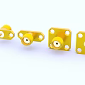 Yellow Metal Connectors With Square And Circular Mounting Hardware Components