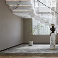 Modern Marble Staircase With Black Metal Railing And LED Strip Lights In Bright Interior