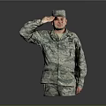 Portrait Of Man In Military Uniform Saluting Wearing Cap Standing Against Gray Background