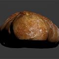 Golden Brown Baked Baguette With Crispy Crust On Black Background
