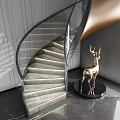 Elegant Spiral Staircase With Gold Accents Glass Railing And Golden Deer Sculpture