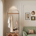 Green Two Seater Sofa With Coat Hanger Clothes Pink Bag Decorative Paintings And Flowers