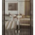 Modern Double Doors With Dark Frames Metal Handles And Golden Circular Radial Design