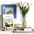 Cozy Living Room Interior With Blue Framed Mountain Painting White Tulips Clear Vase And Books
