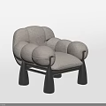Modern Beige Upholstered Lounge Chair With Puffed Arms And Black Legs