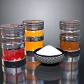 Glass Spice Jars With Metal Lids Containing Red Orange Brown Spices And White Powder Bowl