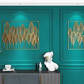 Elegant Modern Gold Leaf Wall Decor on Teal Green Wall with Artistic Accents