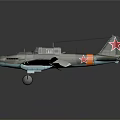 Vintage Military Airplane Model With Camouflage Paint Red Stars On Wings And Red Nose