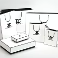 Chanel Luxury Shopping Bags And Elegant Gift Boxes In Assorted Sizes
