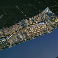 Aerial View Planning of Waterfront Urban Development with Illuminated Buildings and Green Spaces