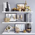 Decorative Ornament Set With Golden Deer Candle Holders Feather Art Frames And Books On Shelf