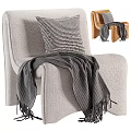 Cozy Modern Upholstered Lounge Chair With Striped Pillow And Knitted Blanket