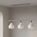 Modern Three Pendant Chandelier With White Shades And Metal Bar In Interior Space