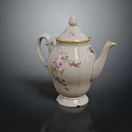 White Ceramic Teapot With Pink Floral Patterns And Gold Trim On Dark Background