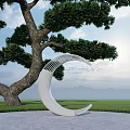 White Curved Sculpture By Tall Tree On Slab Pavement With Grassland Mountains And Blue Sky